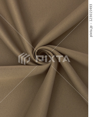 Close-up of twisted brown curtain fabric texture in smooth folds 123015493