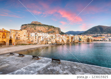 Fantastic evening cityscape of Cefalu city. Popular travel destination of Mediterranean sea. Fantastic evening cityscape of Cefalu city. Popular travel destination of Mediterranean sea. 123015925