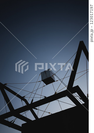 Abstract sculpture in Cuenca against the twilight sky highlighting modern artistry in a historic European town, geometric design 123017197