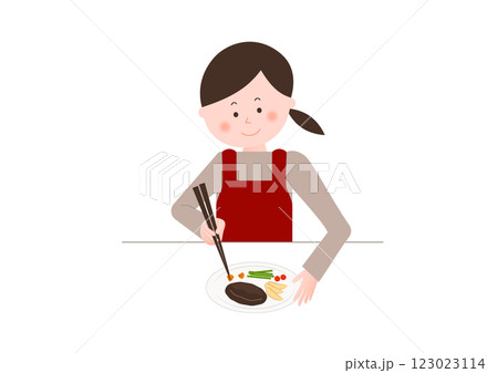 料理をする女性(盛り付け) 料理をする女性(盛り付け) 123023114