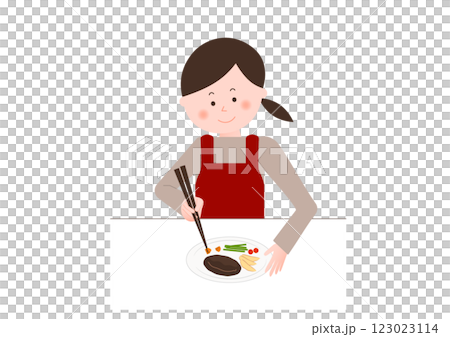 料理をする女性(盛り付け) 料理をする女性(盛り付け) 123023114