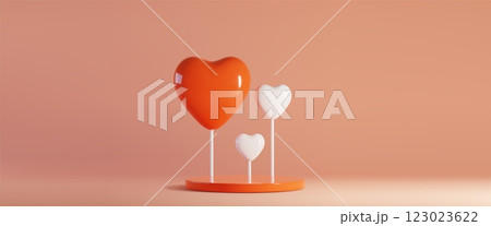 Love shaped candy balloons on round red podium Love shaped candy balloons on round red podium 123023622