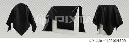 Cover cloth reveal showing draped black fabric 123024596