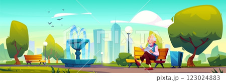 Elderly man reads newspaper in public urban park Elderly man reads newspaper in public urban park 123024883