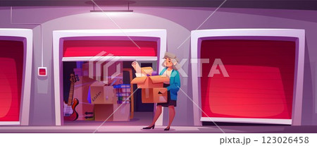 Woman with boxes near self storage container. Woman with boxes near self storage container. 123026458