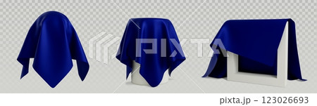 Cover cloth reveal showing draped blue fabric 123026693