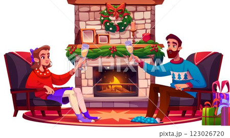 Couple celebrates holiday evening beside fireplace 123026720