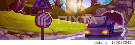Car entering road tunnel in summer forest 123027042