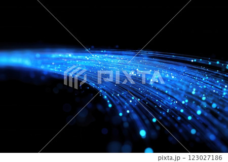 Dark background with dynamic blue fiber optic light trails artistic digital perspective Dark background with dynamic blue fiber optic light trails artistic digital perspective 123027186