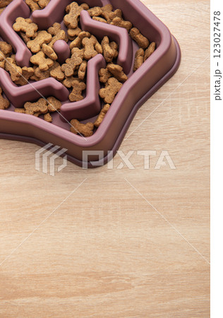 Slow feeder dog bowl reducing bloating and improving digestion 123027478