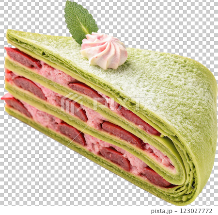 Tempting Layered Cake Slice with Creamy Frosting and Mint Garnish 123027772