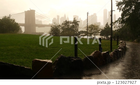 Brooklyn Bridge, Dumbo, rainy foggy day. New York City Manhattan downtown skyline. World Trade Center 123027927
