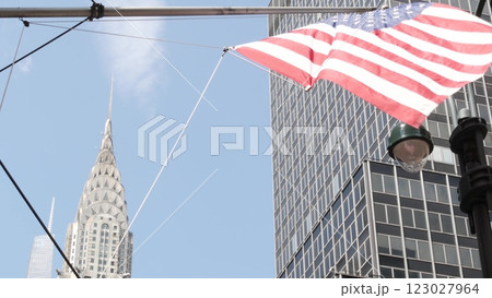 New York, american flag waving. Chrysler building. Manhattan midtown city street banner, patriotism. 123027964