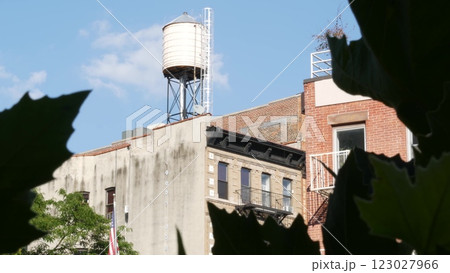 New York City street crossroad, yellow traffic light, transport road intersection, United States. 123027966