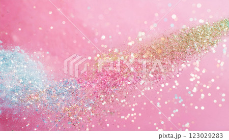 カラフルなラメが飛び散っているピンクの背景 カラフルなラメが飛び散っているピンクの背景 123029283