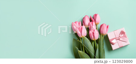 Bouquet of pink tulips and gift box,Spring flowers. Flat lay. Copy space. Banner. 123029800