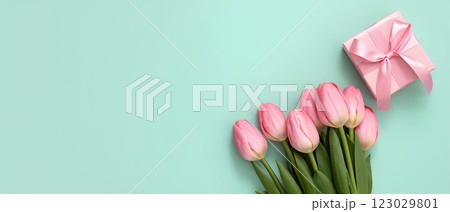 Bouquet of pink tulips and gift box,Spring flowers. Flat lay. Copy space. Banner. 123029801