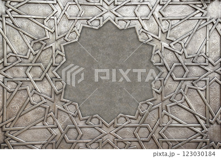 Frame with traditional islamic ornament. Copper window shutter with antique and national moroccan floral pattern. Oriental ornaments with artistic with chasing for brass. Copy space for text Frame with traditional islamic ornament. Copper window shutter with antique and national moroccan floral pattern. Oriental ornaments with artistic with chasing for brass. Copy space for text 123030184