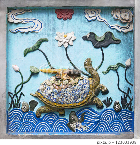 Hanoi, VIETNAM - JANUARY 12, 2015 - Ceramic decoration of entrance in Ngoc Son temple, Hanoi Hanoi, VIETNAM - JANUARY 12, 2015 - Ceramic decoration of entrance in Ngoc Son temple, Hanoi 123033939