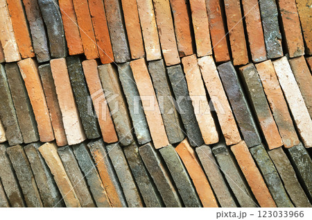 Background of old clay tiles in a pile 123033966