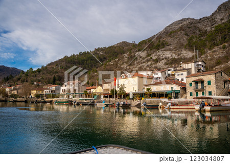 A lot of boat on Crnojevic river in small town near Skadar lake in Montenegro in winter time A lot of boat on Crnojevic river in small town near Skadar lake in Montenegro in winter time 123034807