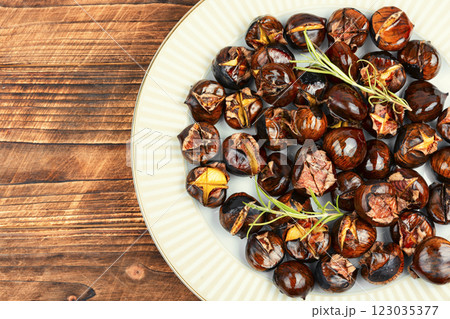 Charred roasted Chestnuts. 123035377