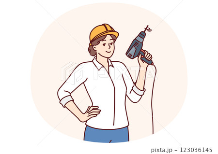 Woman with electric drill and hardhat for construction work or renovation premises Woman with electric drill and hardhat for construction work or renovation premises 123036145