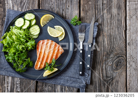 grilled tuna steak on a plate, top view 123036205