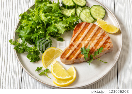 grilled tuna steak on a plate, top view 123036208
