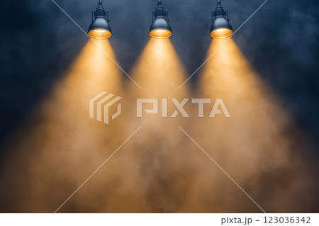 Stage spotlights with dramatic smoke effect 123036342
