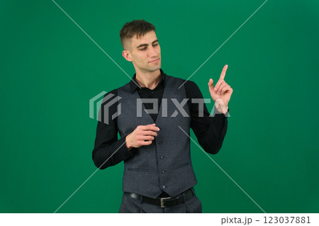 Portrait of a successful man holding something on the palms of the hands, isolated on a gray background Portrait of a successful man holding something on the palms of the hands, isolated on a gray background 123037881