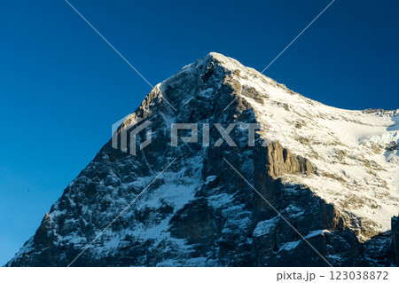 Eiger Mountain North Face at Sunset in Winter. Switzerland Eiger Mountain North Face at Sunset in Winter. Switzerland 123038872