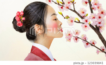 桜を見る美しい若い女性 123039841