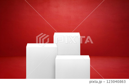 White product display stand in a studio room with a red background for product display and presentation. 123040863