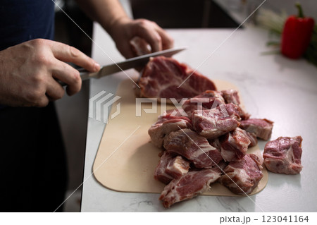Preparing fresh meat to create culinary delights and exquisite dishes for home and restaurant 123041164