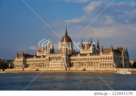 Hungarian Parliament Building in Budapest at sunset with reflection in Danube River. Neo Gothic architecture and famous landmark of Hungary Hungarian Parliament Building in Budapest at sunset with reflection in Danube River. Neo Gothic architecture and famous landmark of Hungary 123041170