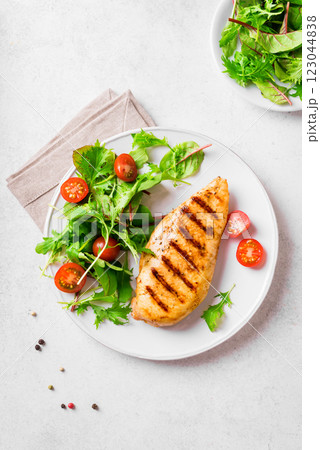 Grilled chicken breast and vegetable salad Grilled chicken breast and vegetable salad 123044838