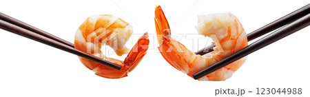 Closeup of a Juicy Shrimp Held by Wooden Chopsticks Isolated on White - Generative Ai 123044988