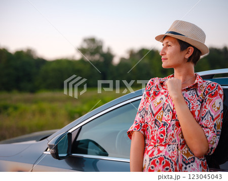 Traveler woman drives car through scenic countryside of Croatia 123045043
