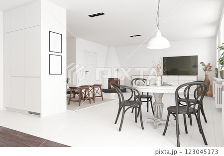 Modern white dining room with black chairs and a TV. 123045173