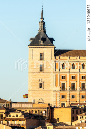 The majestic Alcazar of Toledo stands tall against a clear blue sky, showcasing its architectural grandeur. The majestic Alcazar of Toledo stands tall against a clear blue sky, showcasing its architectural grandeur. 123046673