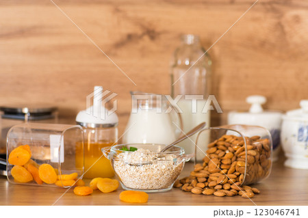 quick breakfast of oatmeal with dried fruits and nuts quick breakfast of oatmeal with dried fruits and nuts 123046741