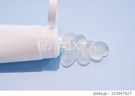 Gel toothpaste in a tube on a blue background. Gel toothpaste in a tube on a blue background. 123047827