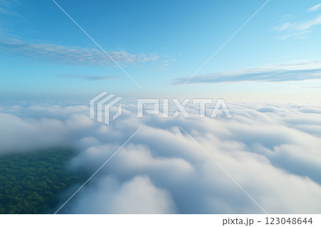 Beautiful aerial view above clouds with blue sky. 123048644