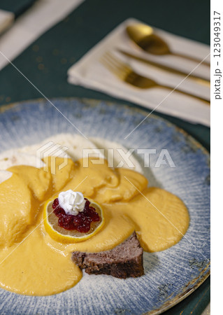 Traditional Christmas dinner in Czech Republic - sirloin in cream sauce 123049317