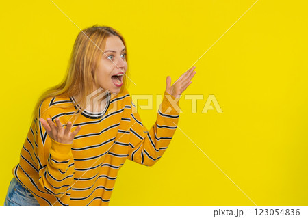 Excited amazed woman surprise looking at camera with big eyes shocked by sudden victory wow emotion Excited amazed woman surprise looking at camera with big eyes shocked by sudden victory wow emotion 123054836