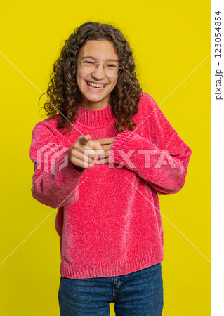 Amused smiling cheerful girl laughing out loud funny ridiculous joke anecdote bullying abuse 123054854