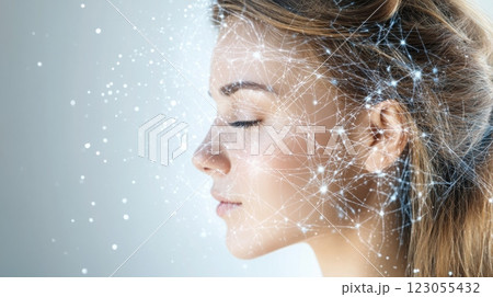A young woman is pictured in profile, her eyes closed, with abstract digital connections and light particles around her head, evoking a sense of tranquility and thoughtfulness. 123055432