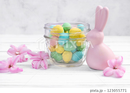 Easter bunny, jar with sweet eggs and hyacinth flowers. Easter bunny, jar with sweet eggs and hyacinth flowers. 123055771