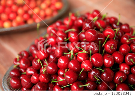 Fresh red cherry fruits in a container 123058345
